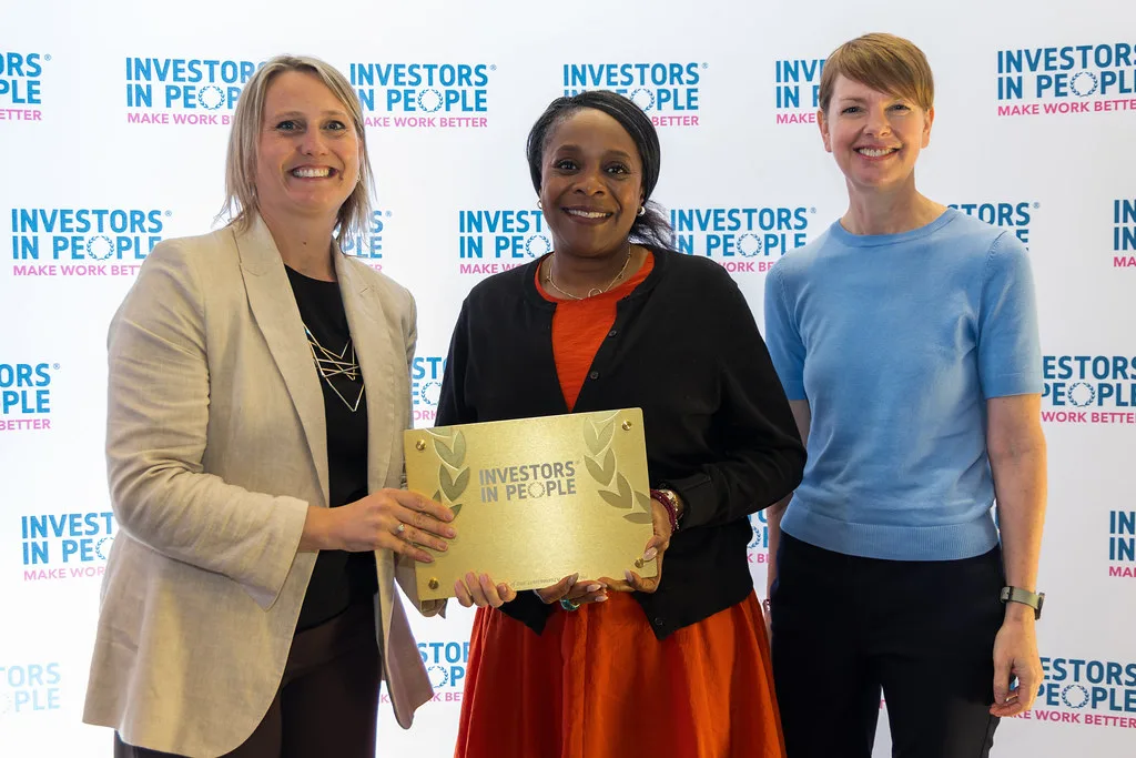An organisation receiving its Investors in People accreditation