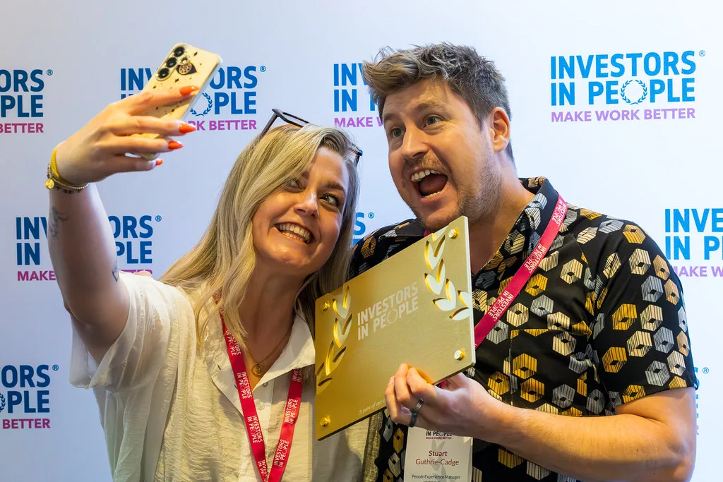 Colleagues celebrating an Investors in People accreditation