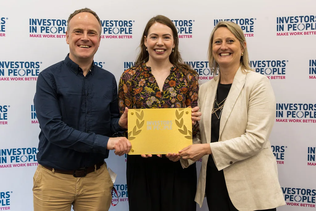 An organisation receiving its Investors in People accreditation