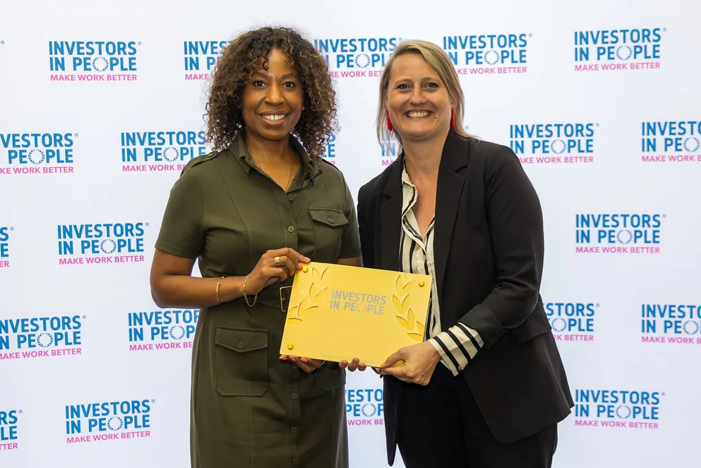 An organisation receiving its Investors in People accreditation