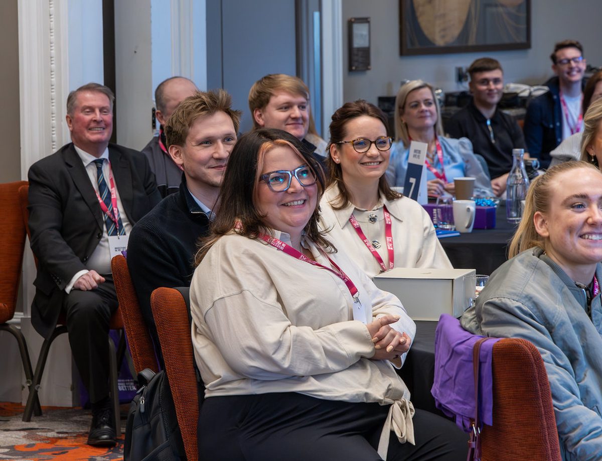 Delegates listening during a session at an Investors in Young People event