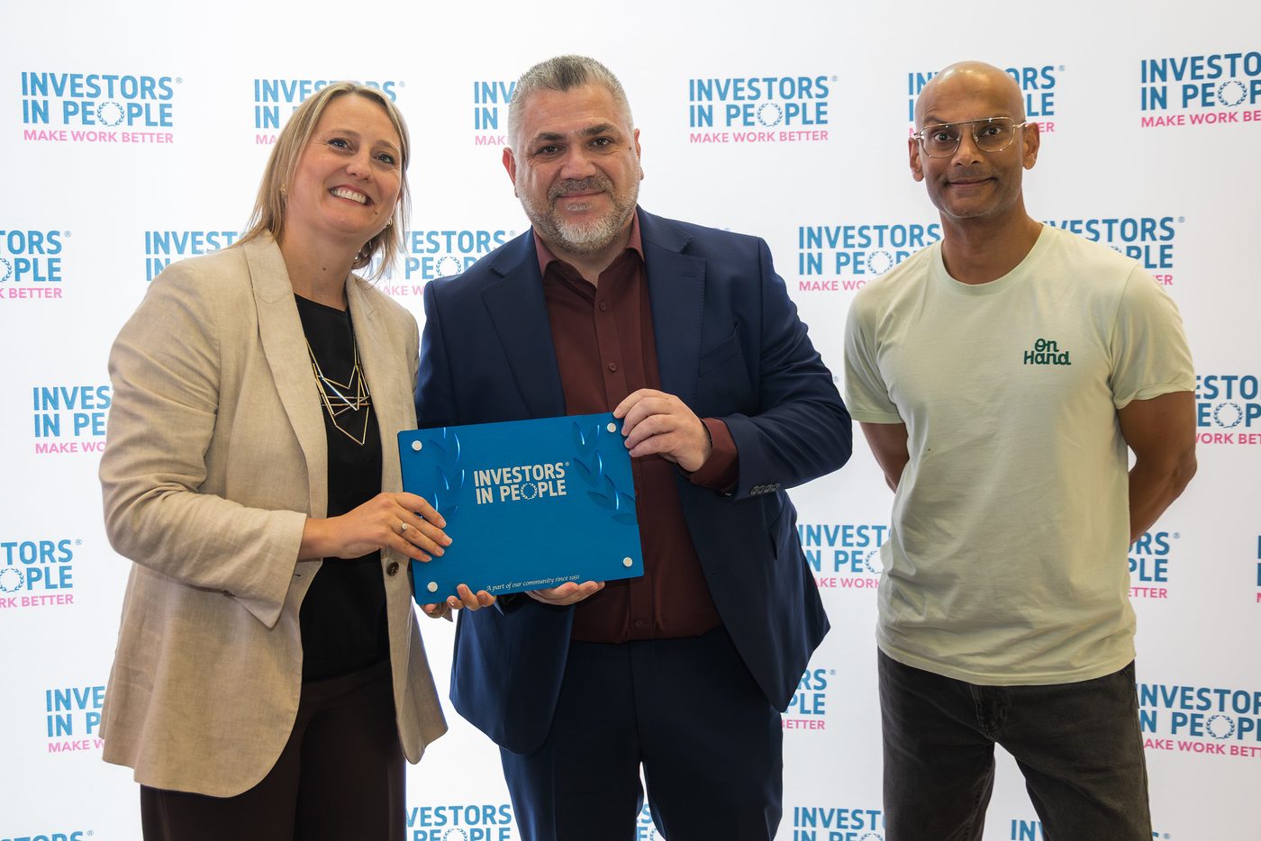 An organisation receiving its Investors in People accreditation