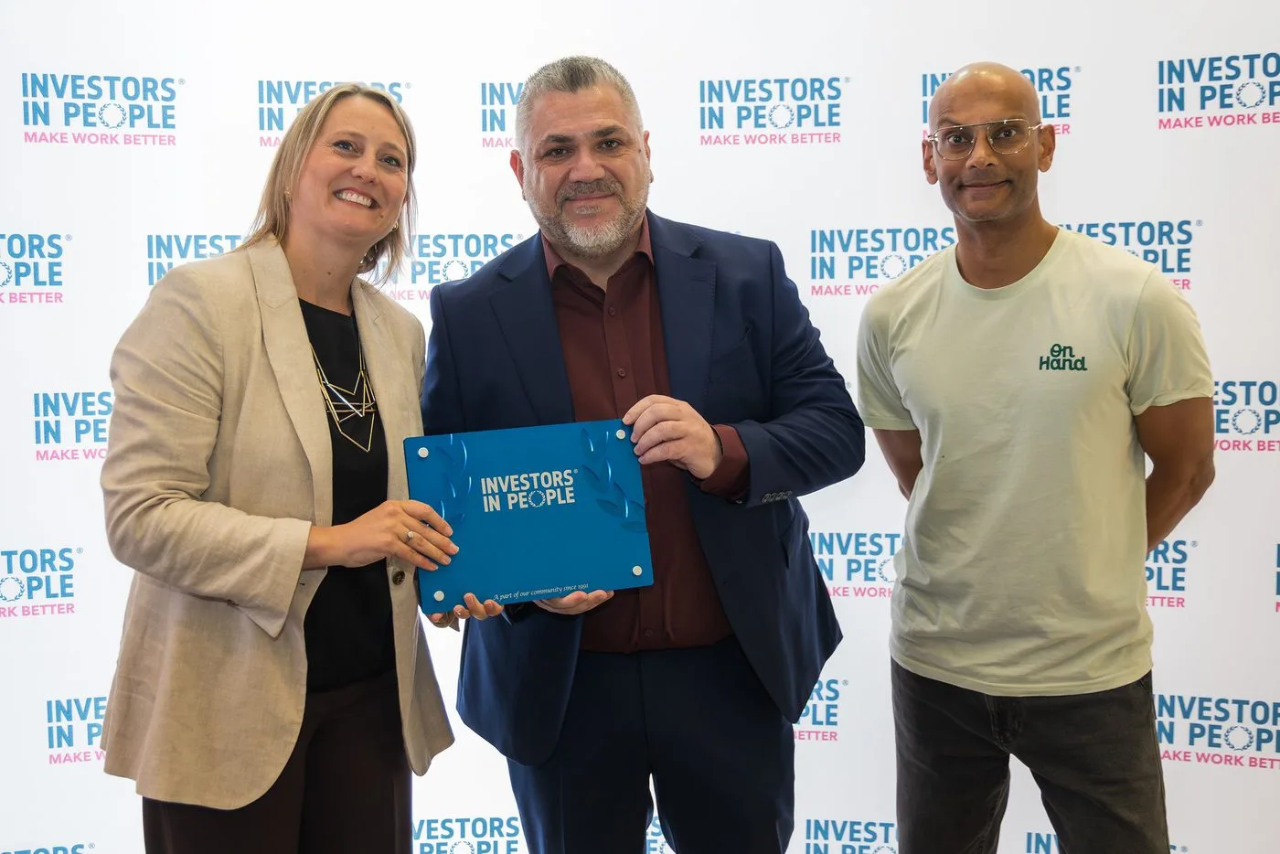 An organisation receiving its Investors in People accreditation