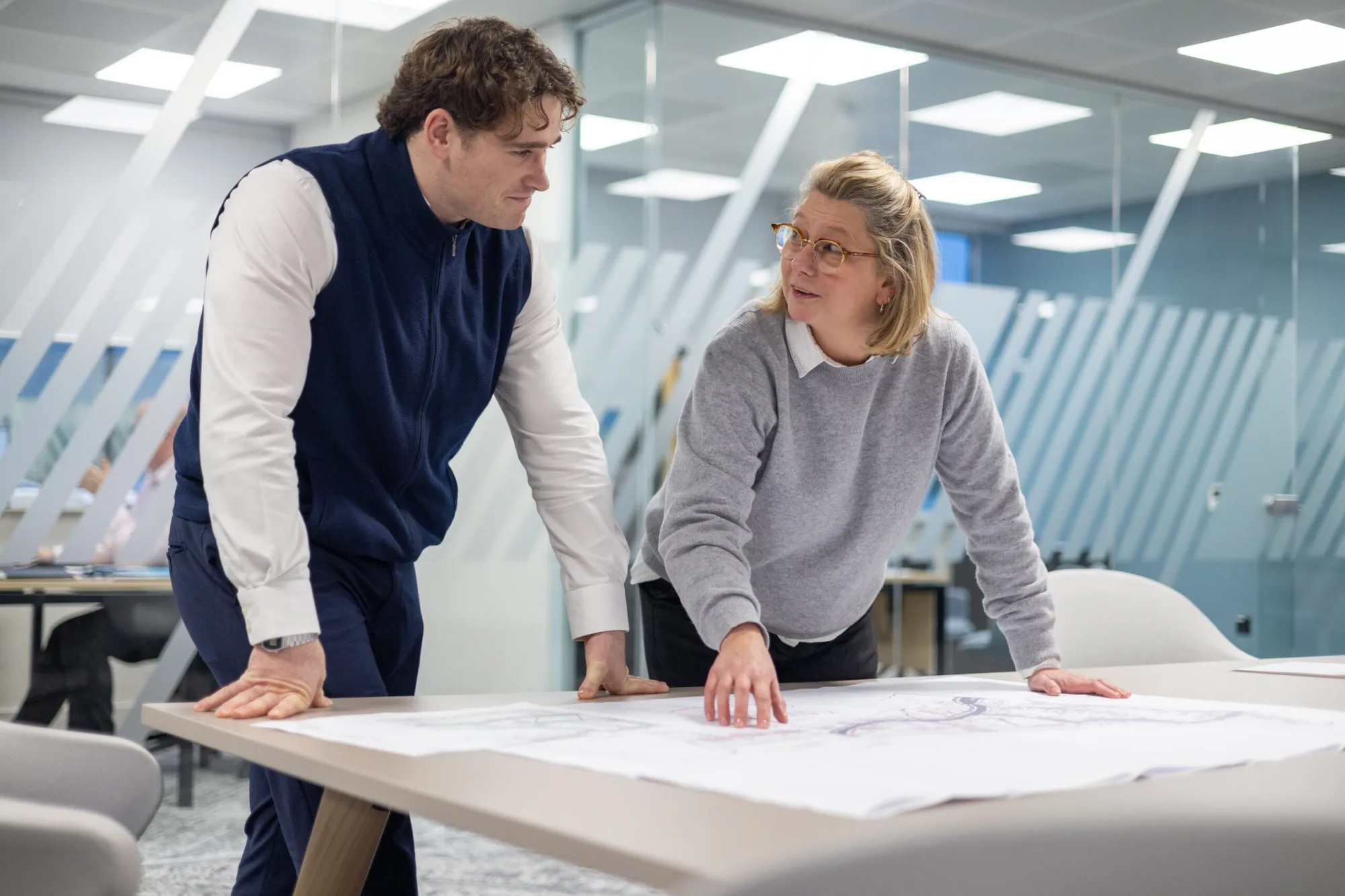 Miller Homes colleagues reviewing development plans together
