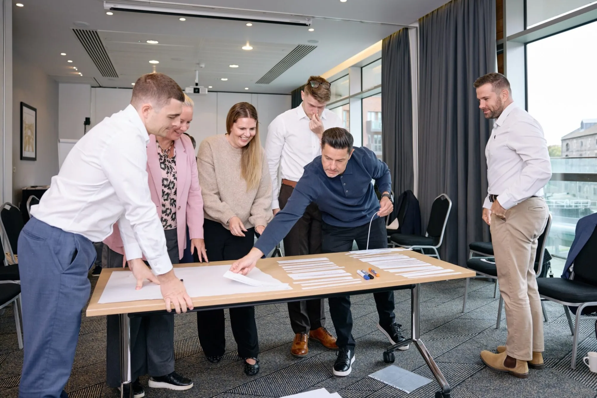 Miller Homes team working together in a management training session