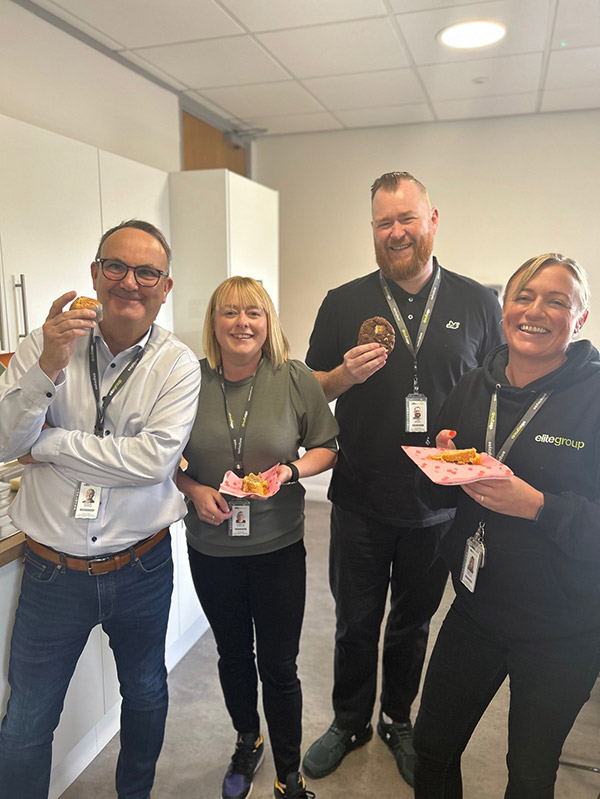 New Technology Group employees together in the office