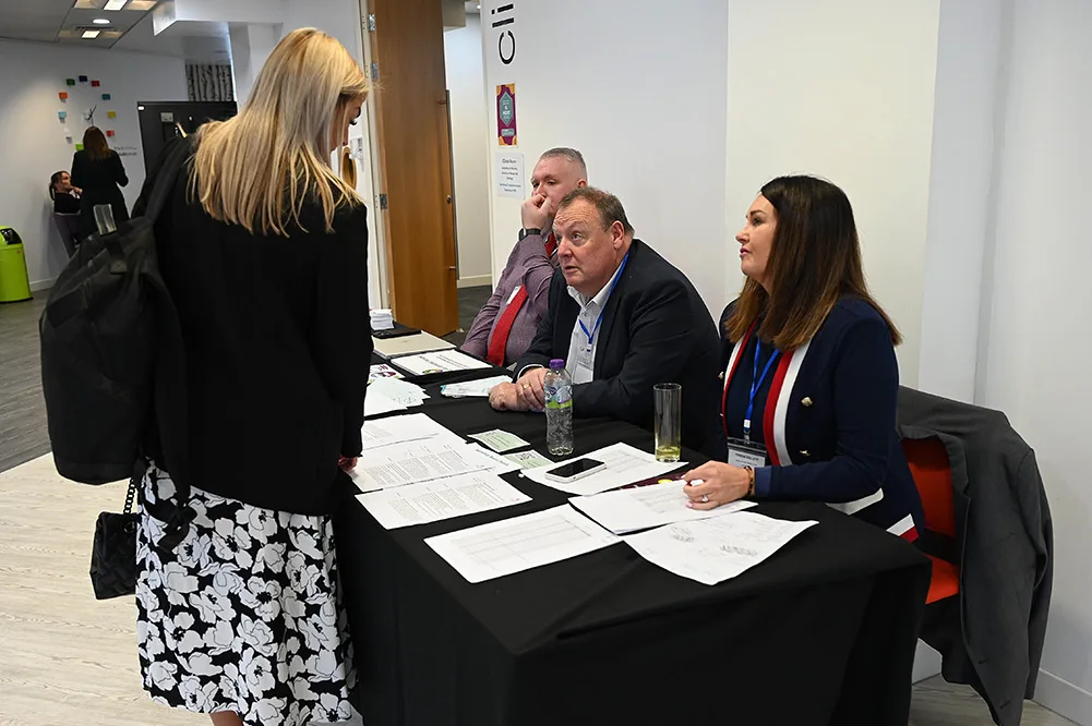 TRFS team in discussion at a panel session