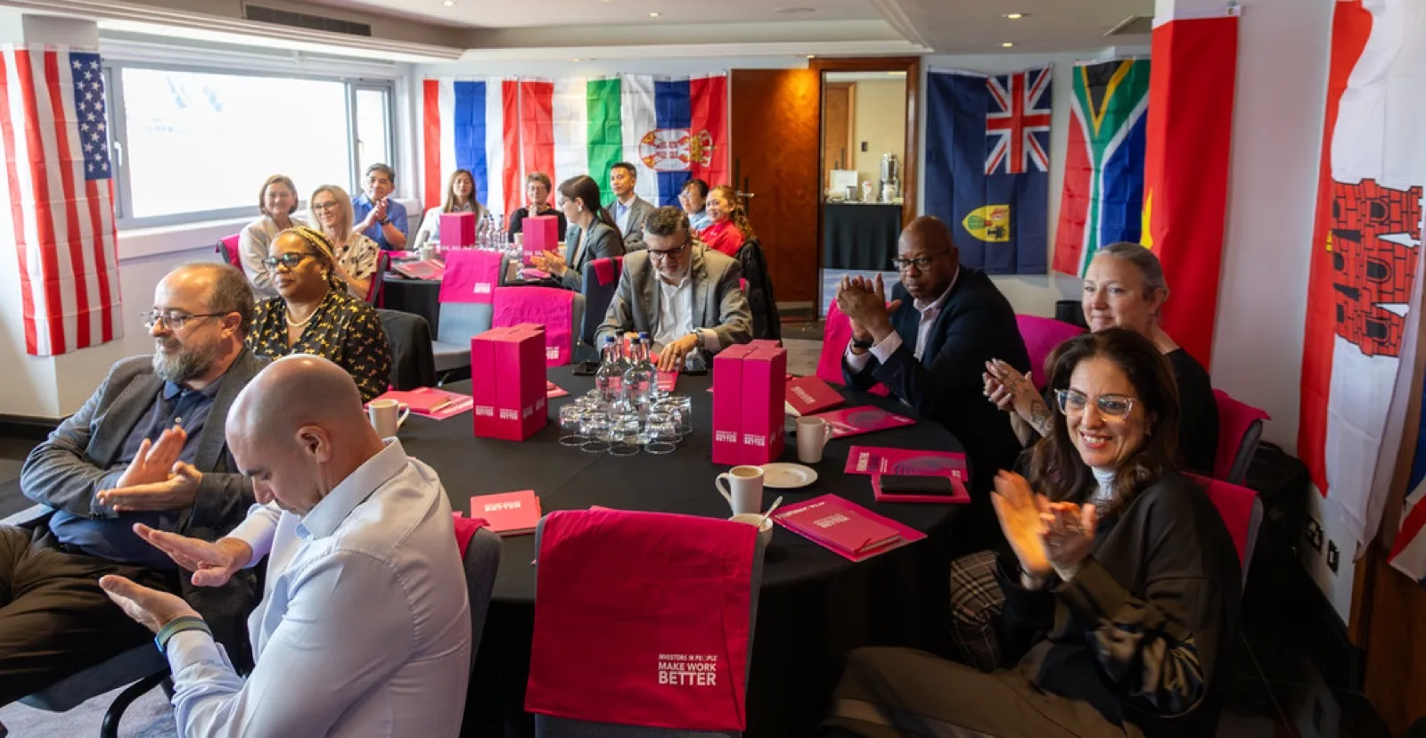 Investors in People practitioners working with a team