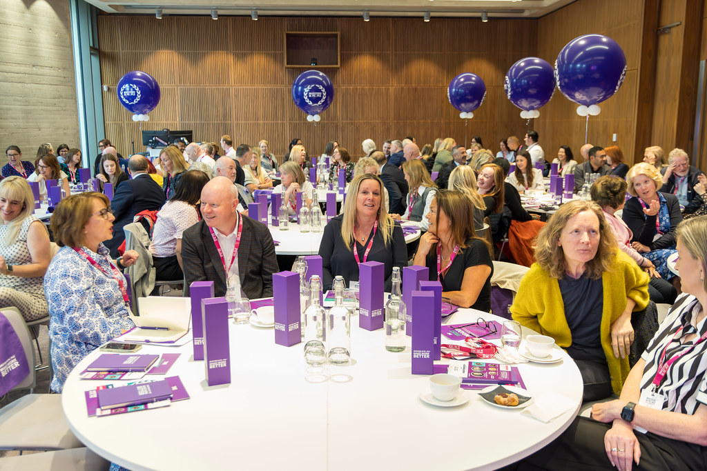 Senior leaders in conversation at an Investors in People event
